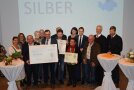 Das Dorf Aschenau auf der Bühne der Abschlussfeier "Unser Dorf hat Zukunft"